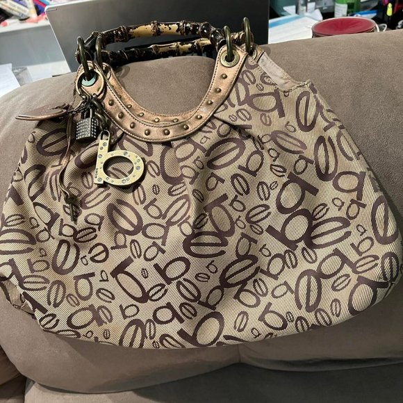 Bebe Purse Bag with Logos and Charms Attached - Picture 1 of 4
